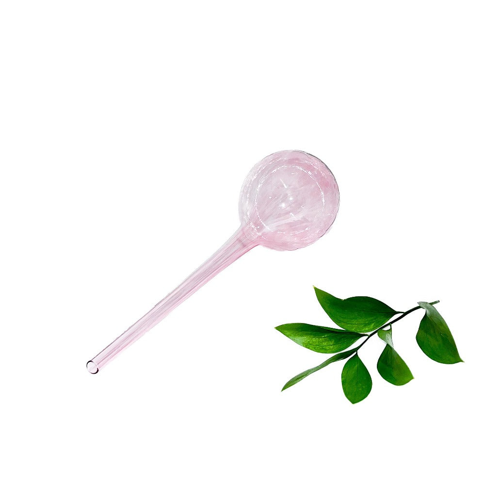 Lasinen kastelupallo