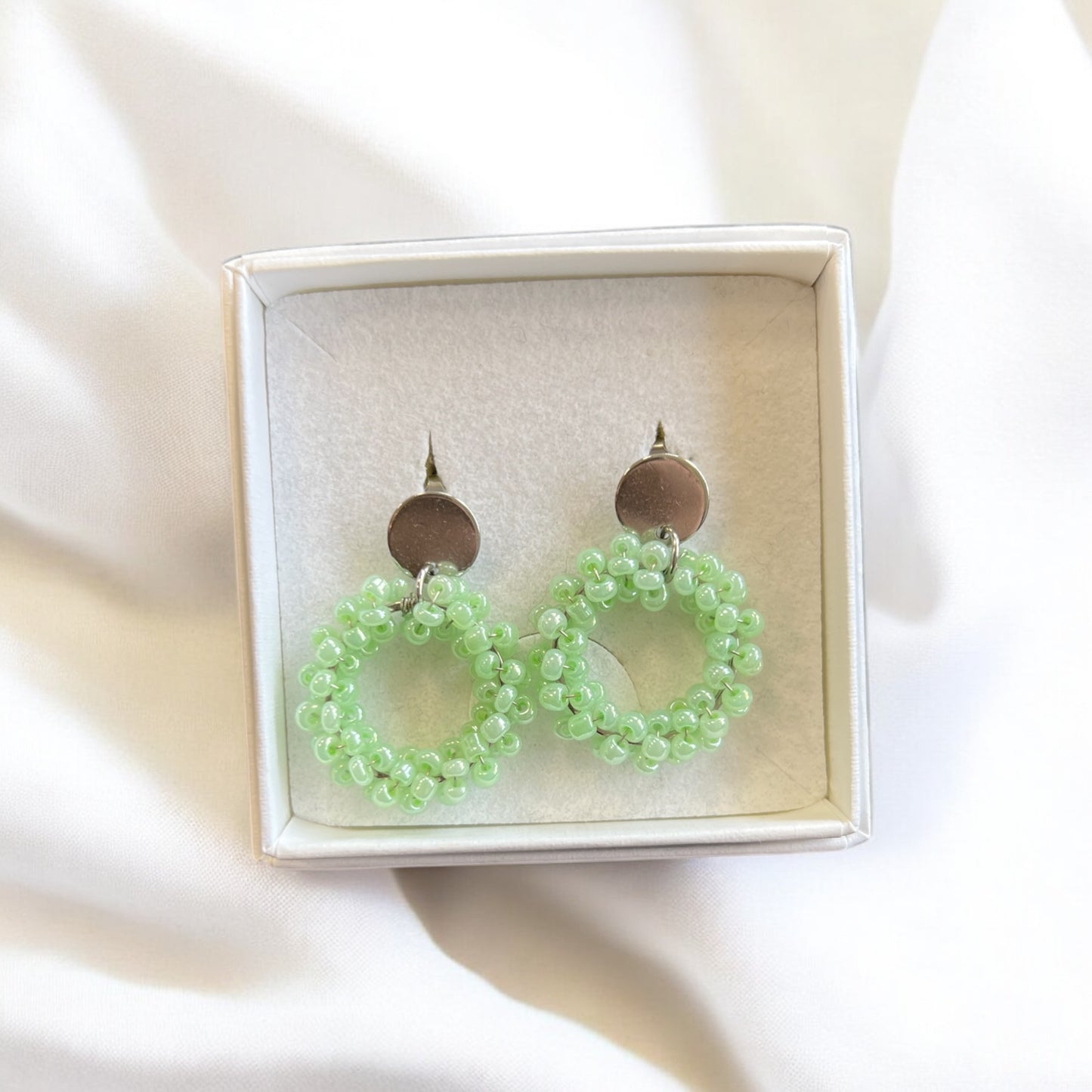 Loviisa Mini earrings, with a flat silver-colored stud