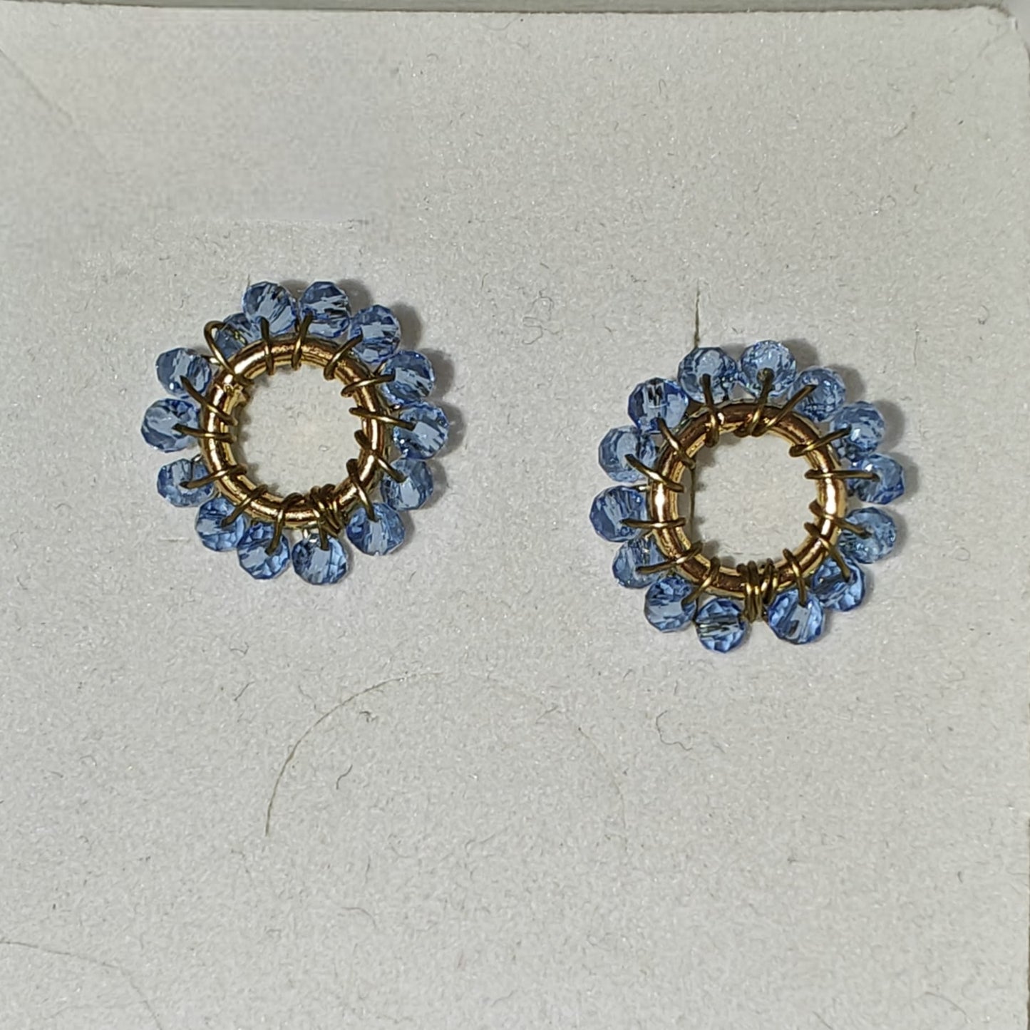 Aava-korvakorut, teräksen värisillä yksityiskohdilla (eri värejä)