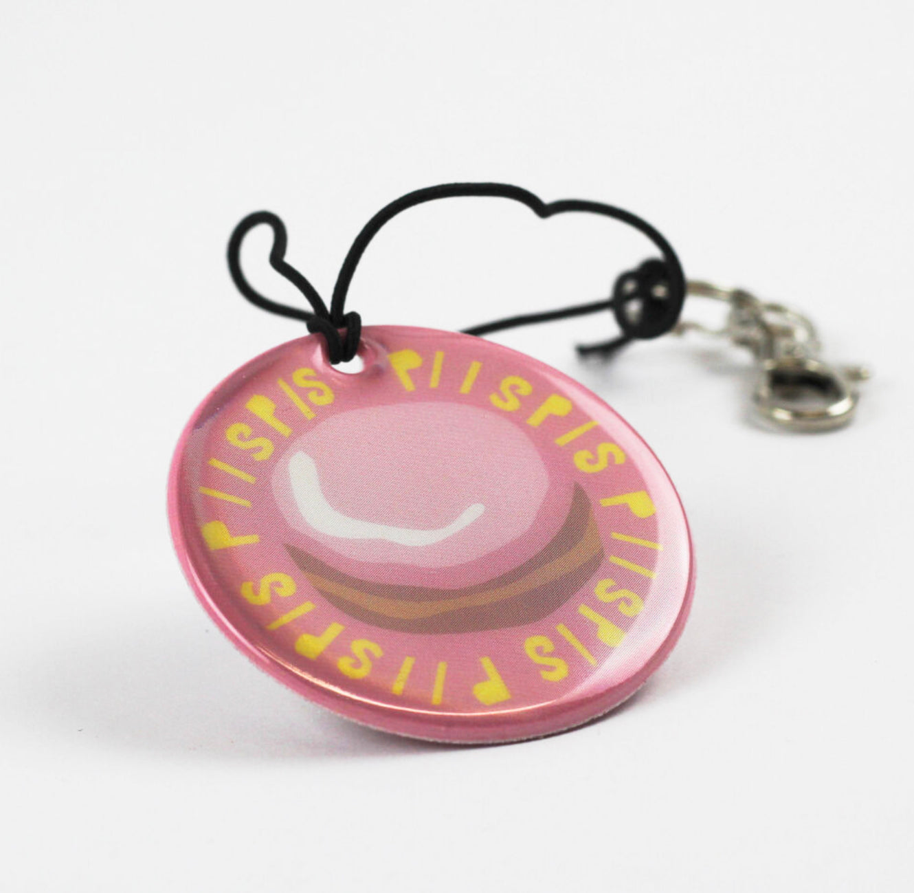 Kui designin vaaleanpunainen Piispis-heijastin. Pyöreä.