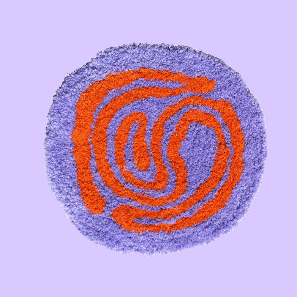 Atomoss Twister-ryijy Lila-orange kaarnavilla verkkokauppa
